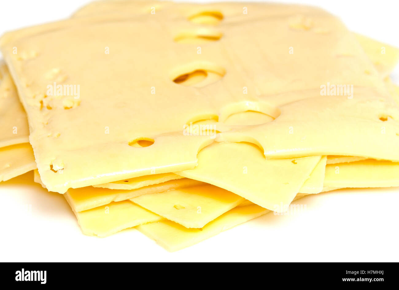 close up of cheese slices on white background Stock Photo