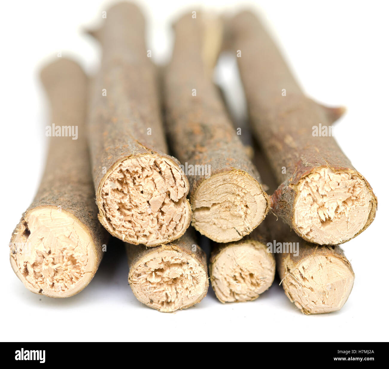 stack of firewood isolated on white background Stock Photo - Alamy