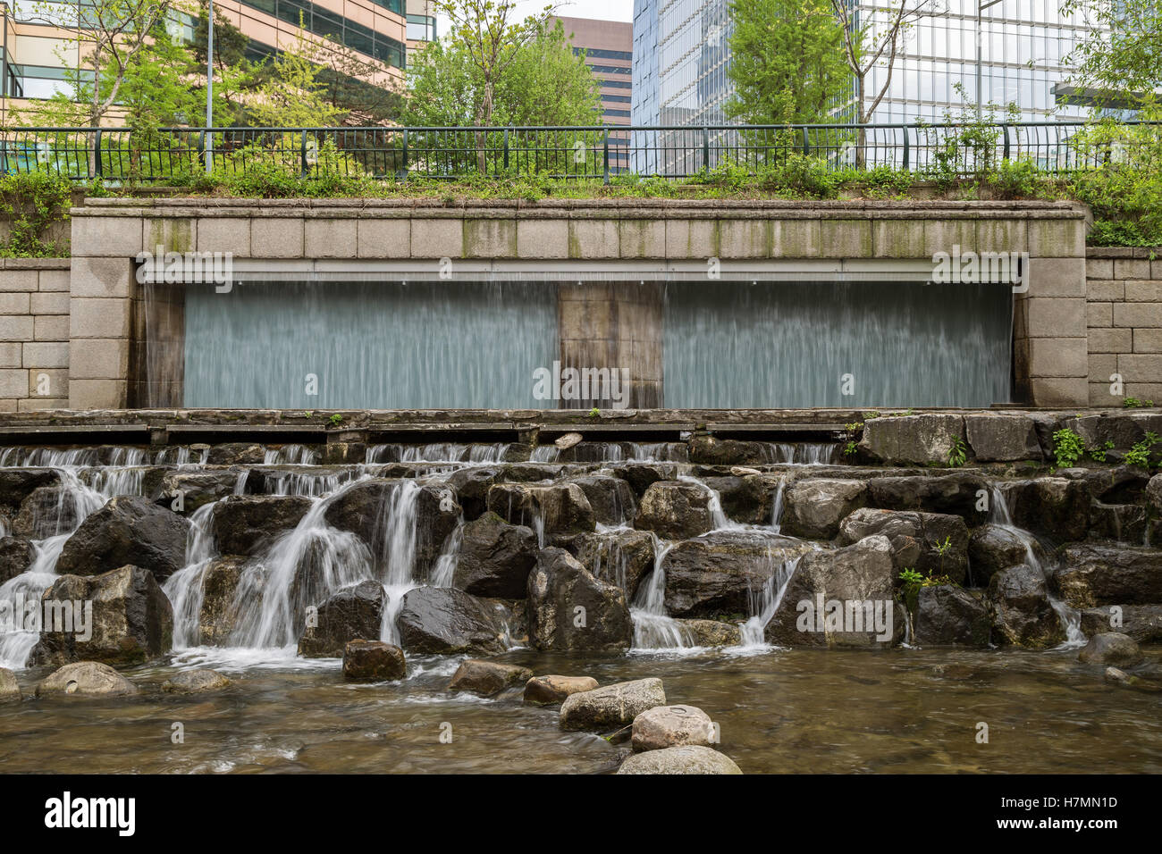 Artificial waterfall along the Cheonggyecheon Stream in Seoul, South Korea, viewed from the front. Stock Photo