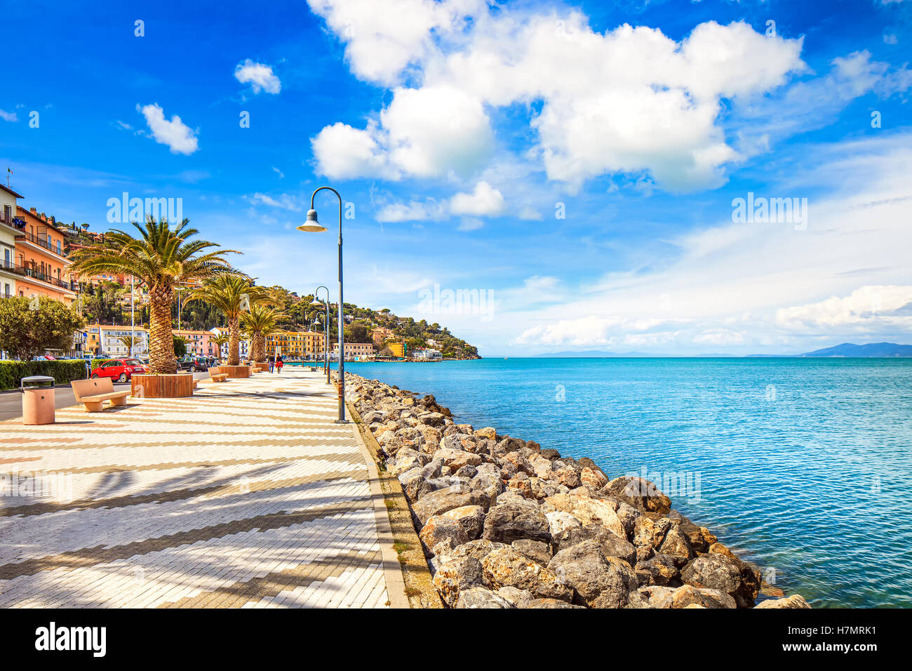 Promenade seafront or esplanade in Porto Santo Stefano harbor, Monte Argentario, Tuscany, Italy. Stock Photo