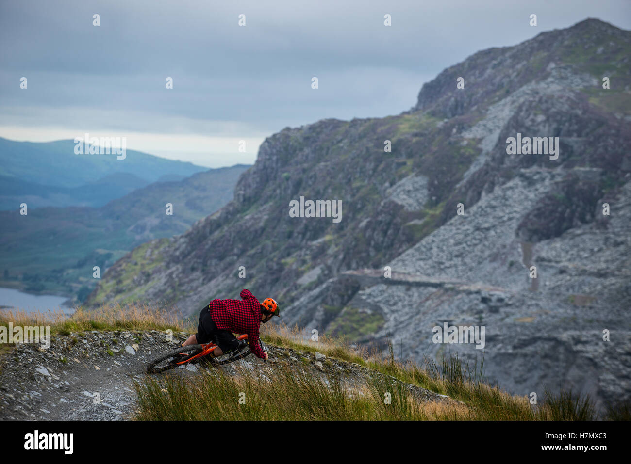 A mountain biker corners at Antur Stiniog mountain bike centre at