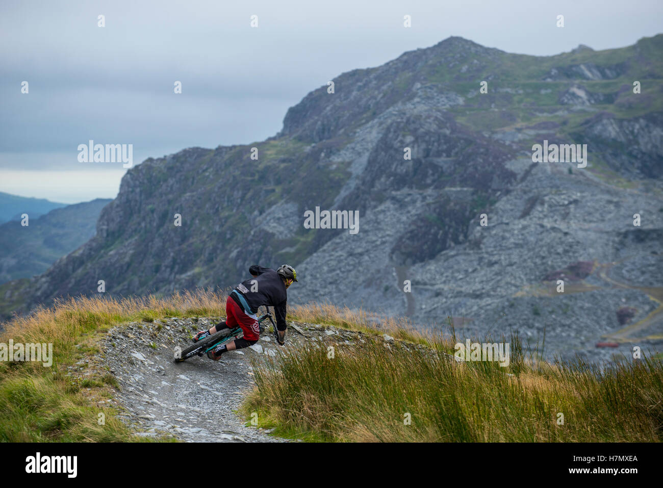 A mountain biker corners at Antur Stiniog mountain bike centre at