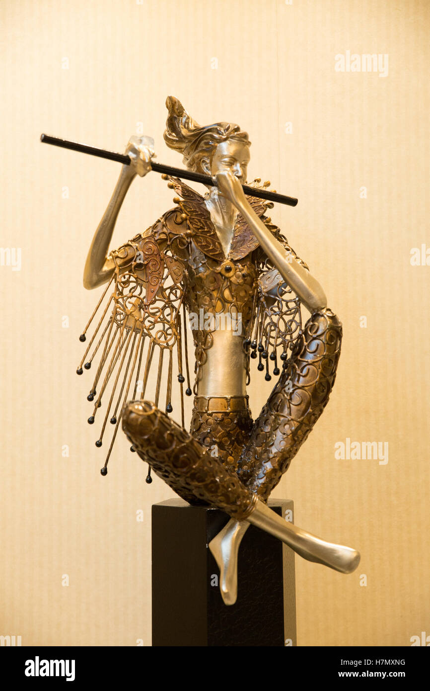 female flute player metal sculpture Stock Photo Alamy