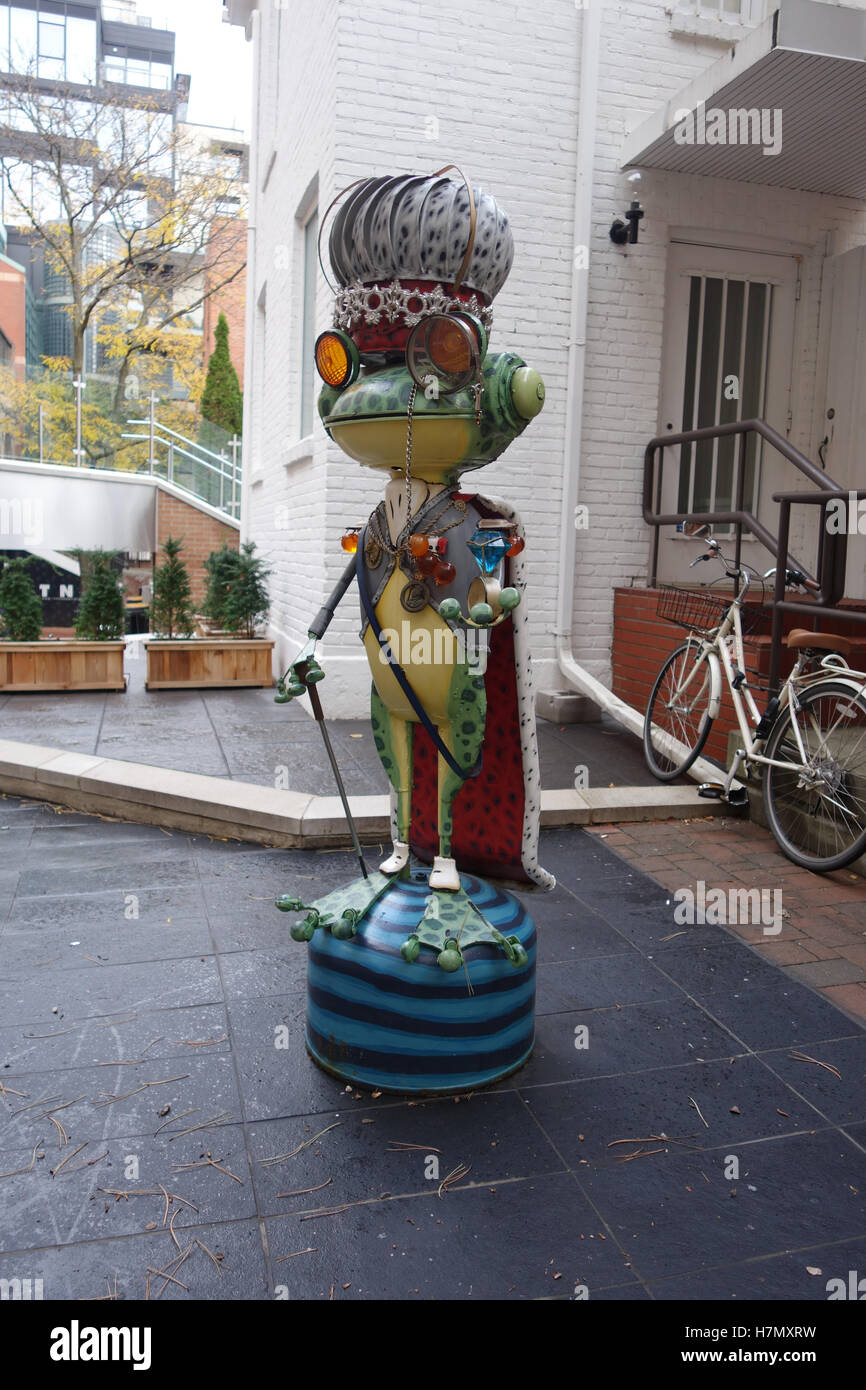 outdoor frog art statue yorkville toronto Stock Photo