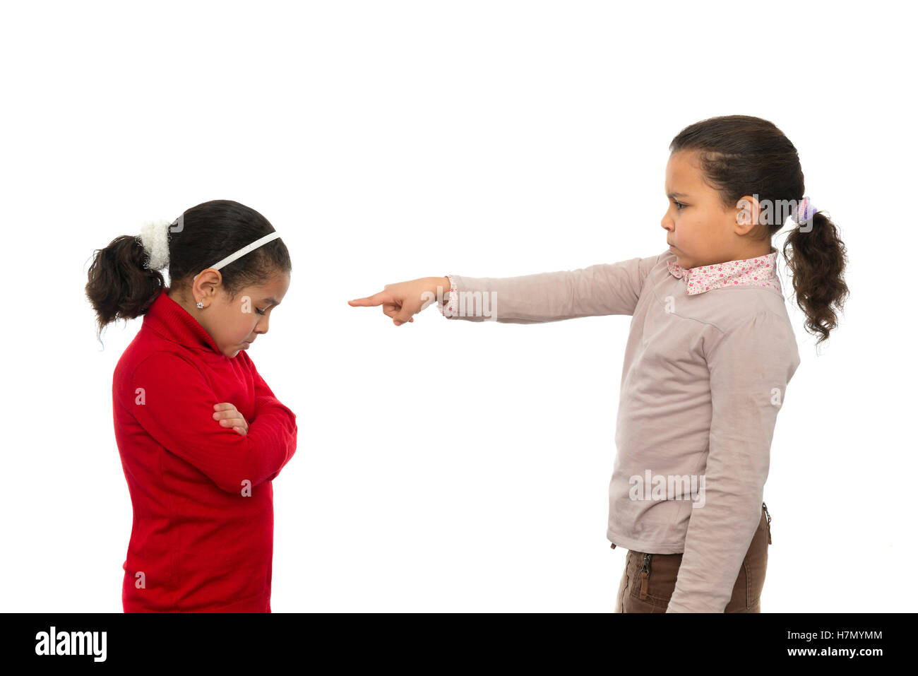 Two Sisters in Quarrel Isolated on White Background Stock Photo