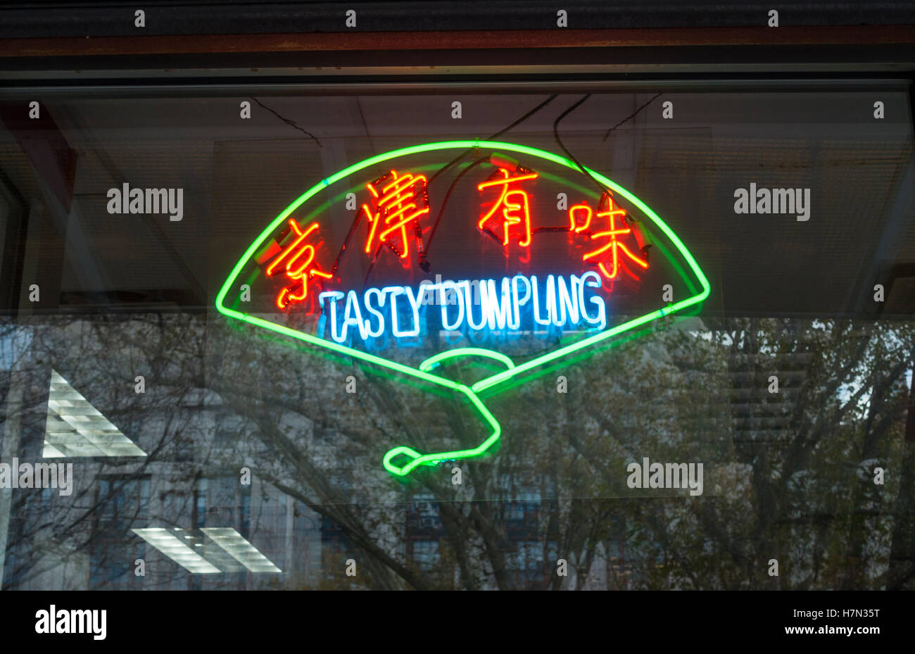 Neon sign in the window of Tasty Dumpling restaurant in Chinatown, New