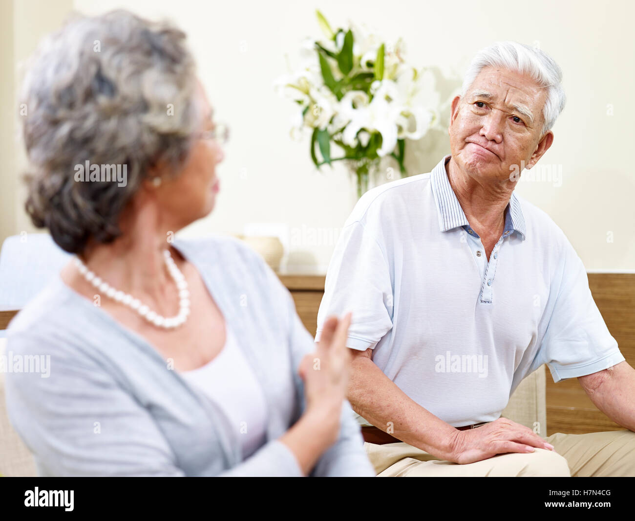 senior asian couple having a fight at home Stock Photo