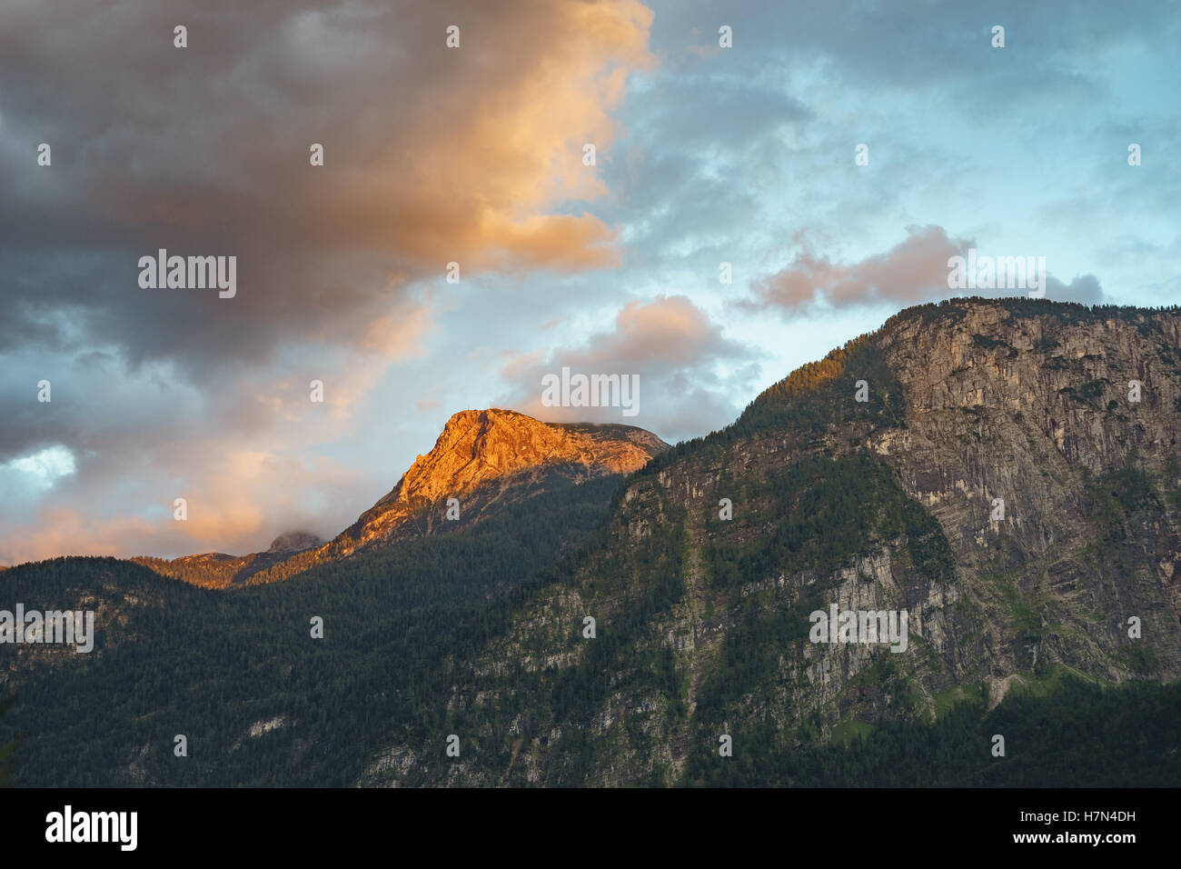 Krippenstein mountain peak in sunset rays and dramatic clouds, Austria Stock Photo