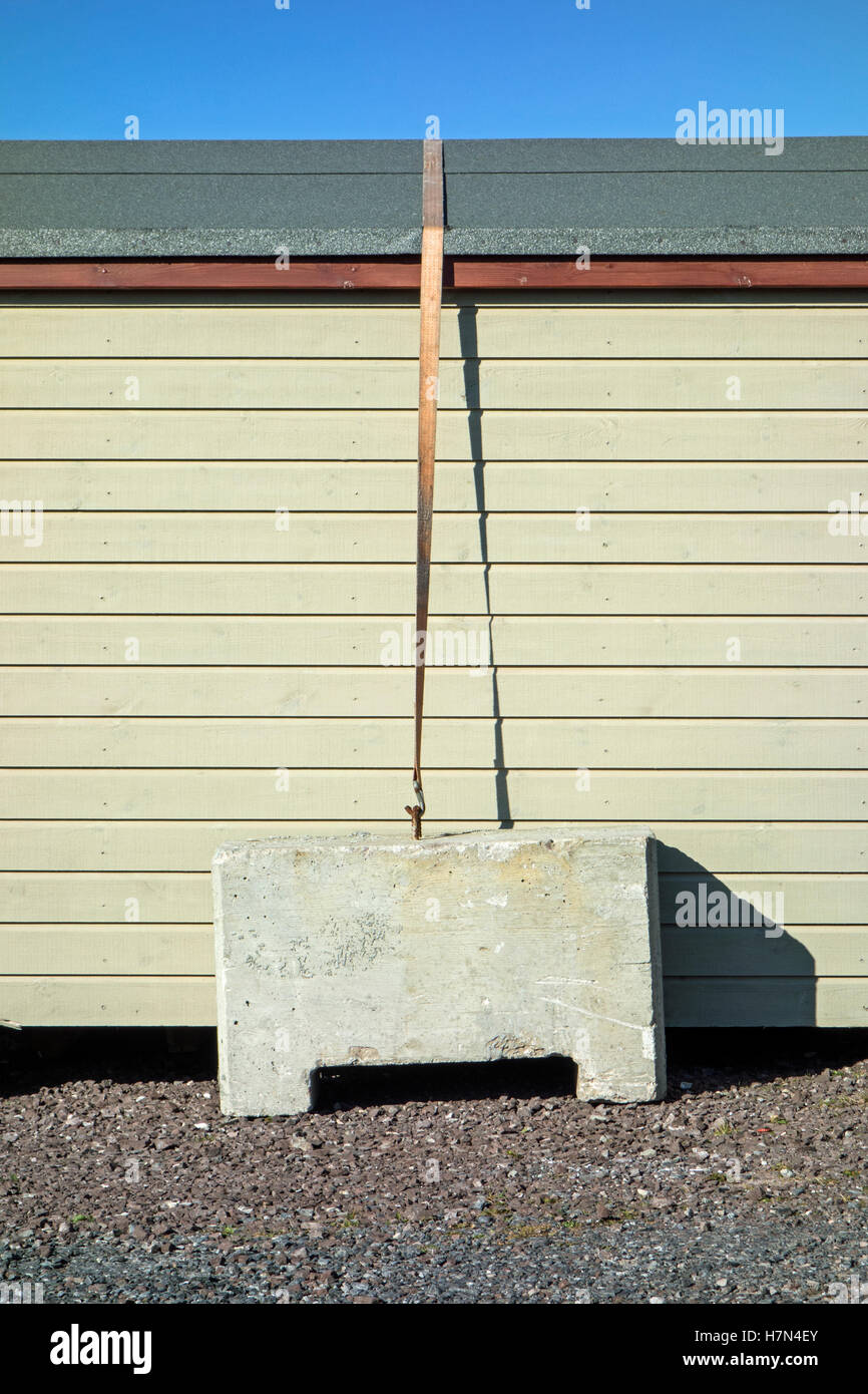 Shed weighted down against wind, Mainland Shetland , Scotland Stock Photo