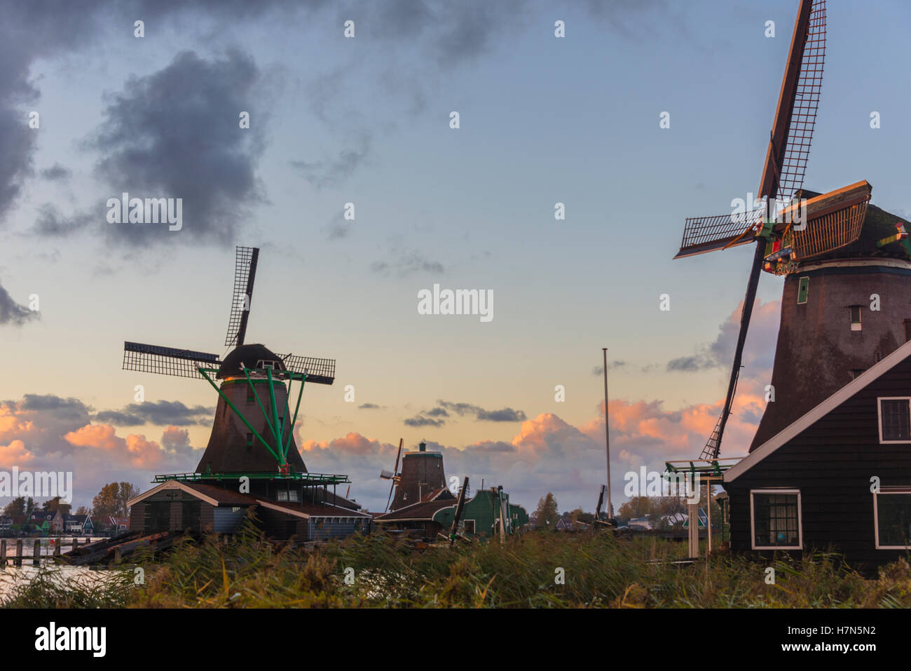 Windmills on water at Zaandam Stock Photo - Alamy