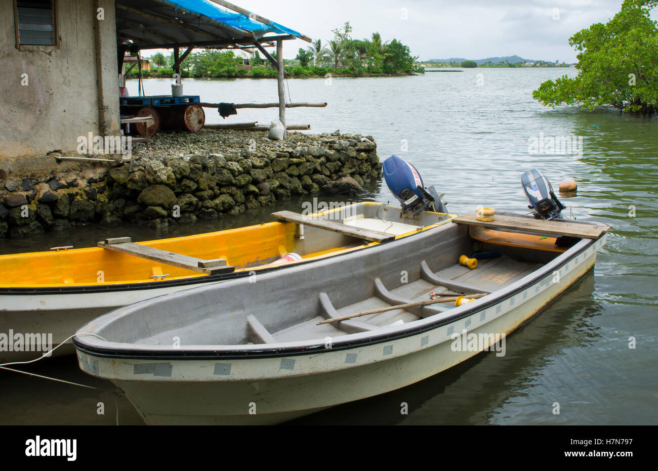 Pohnpei Micronesia boats on water at local homes used for fishing Stock