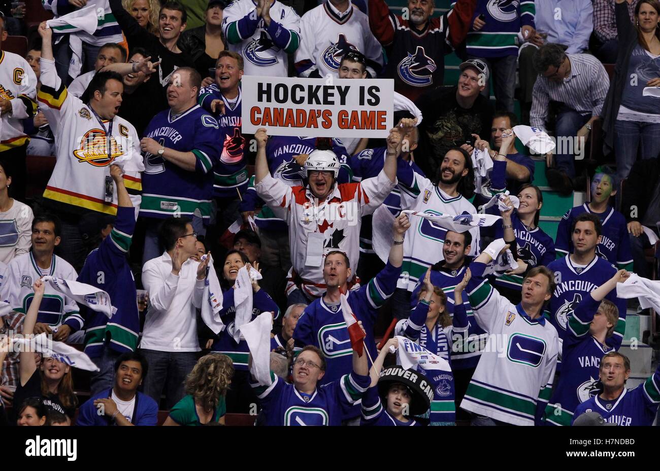 June 10, 2011; Vancouver, BC, CANADA; Fans of the Vancouver Canucks cheer during game five of the 2011 Stanley Cup Finals against the Boston Bruins at Rogers Arena. The Canucks won 1-0. Stock Photo