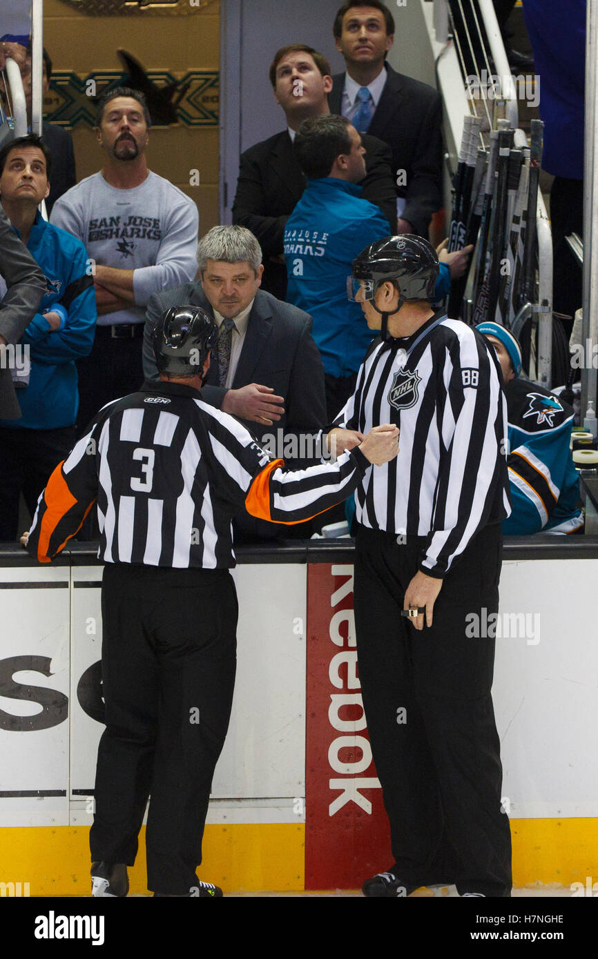 Jan 17, 2012; San Jose, CA, USA; San Jose Sharks head coach Todd McLellan argues with NHL referee Mike Leggo (3) after a goal was disallowed during the overtime period against the Calgary Flames at HP Pavilion. San Jose defeated Calgary 2-1 in shootouts. Stock Photo