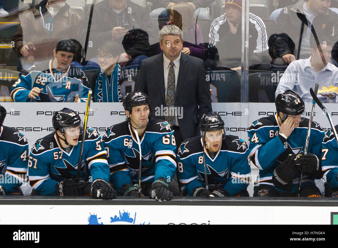 Jan 17, 2012; San Jose, CA, USA; San Jose Sharks head coach Todd McLellan stands behind the bench during the third period against the Calgary Flames at HP Pavilion. San Jose defeated Calgary 2-1 in shootouts. Stock Photo