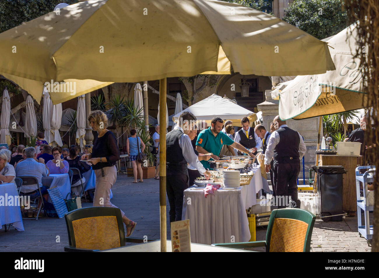 Valletta, walled capital city port of Malta. Outdoor buffet served by the Cafe Cordina. Stock Photo