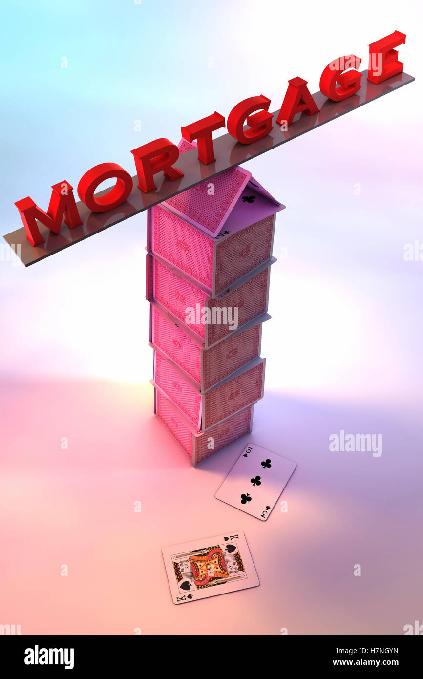 Mortgage balancing on a House of cards Stock Photo