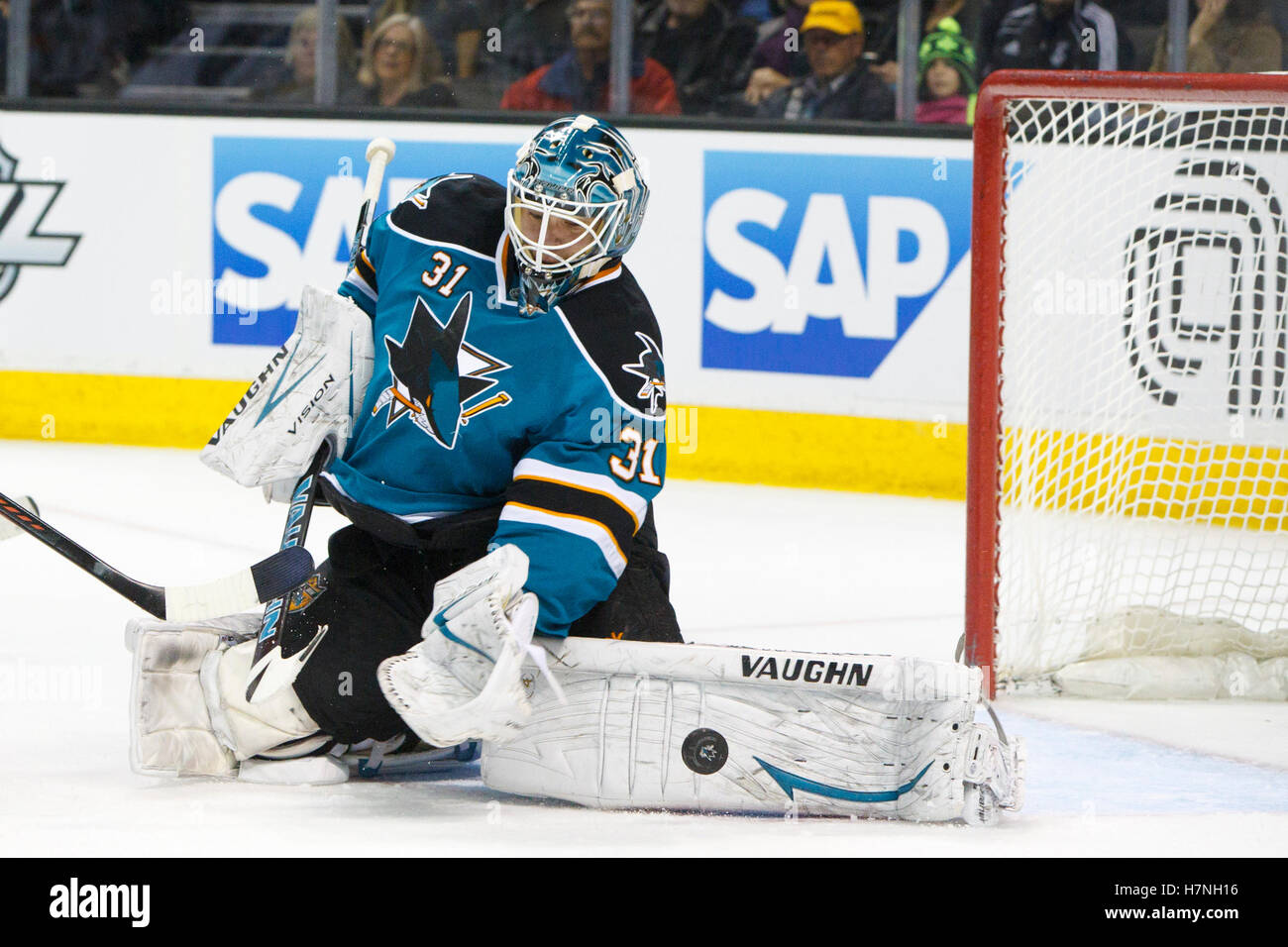 Jan 31, 2012; San Jose, CA, USA; San Jose Sharks goalie Antti Niemi (31) saves a shot against the Columbus Blue Jackets during the first period at HP Pavilion. Stock Photo