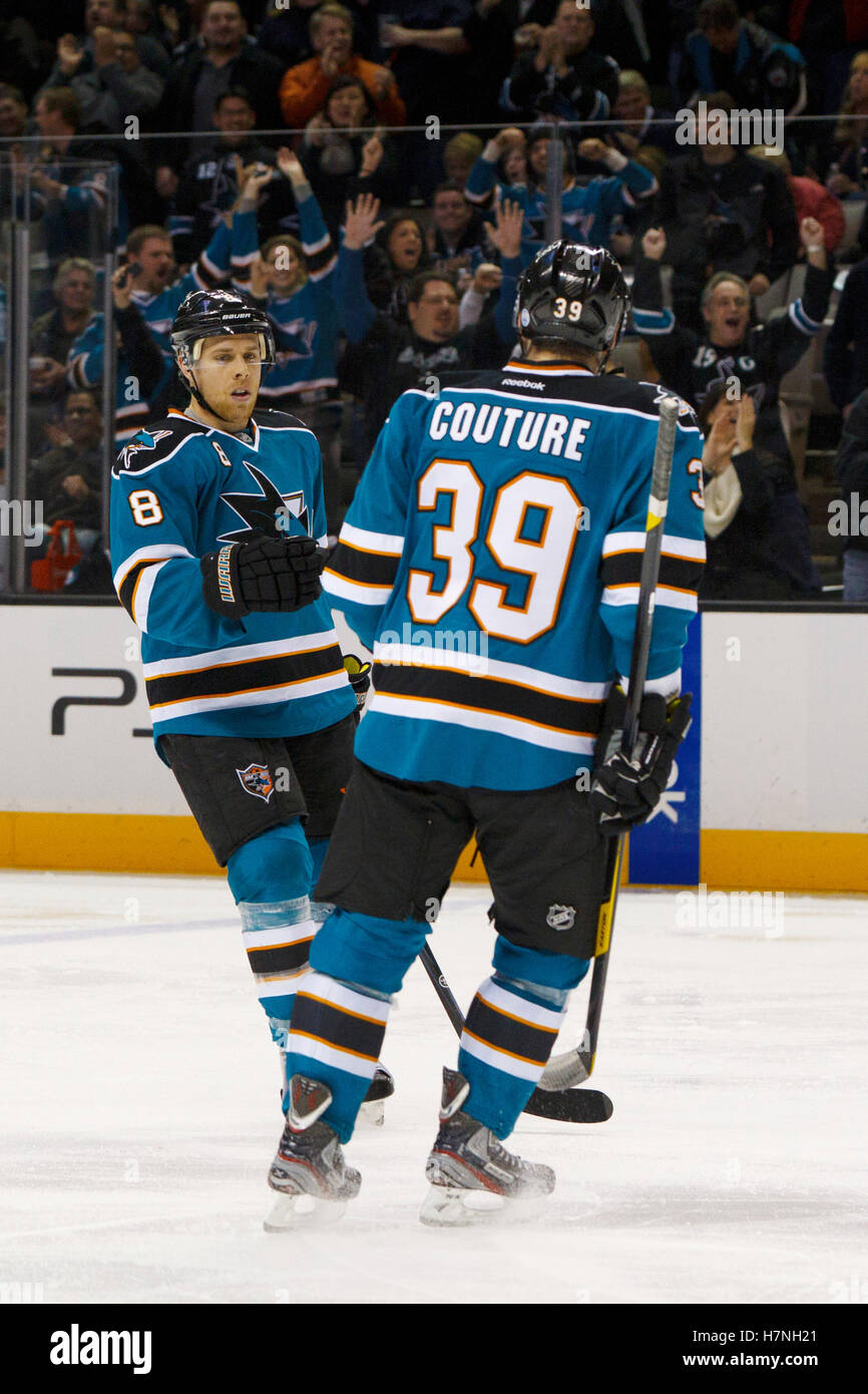 Jan 31, 2012; San Jose, CA, USA; San Jose Sharks center Joe Pavelski (8) is congratulated by center Logan Couture (39) after scoring a goal against the Columbus Blue Jackets during the second period at HP Pavilion. Stock Photo