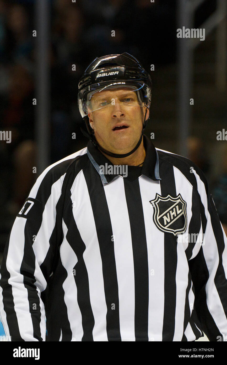 Jan 31, 2012; San Jose, CA, USA; NHL linesman Pierre Champoux (67) before a face off between the San Jose Sharks and the Columbus Blue Jackets during the second period at HP Pavilion. San Jose defeated Columbus 6-0. Stock Photo