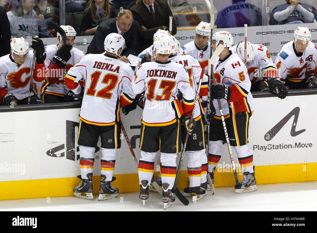 Feb 8, 2012; San Jose, CA, USA; Calgary Flames head coach Brent Sutter talks to his team during a timeout against the San Jose Sharks during the third period at HP Pavilion. Calgary defeated San Jose 4-3. Stock Photo