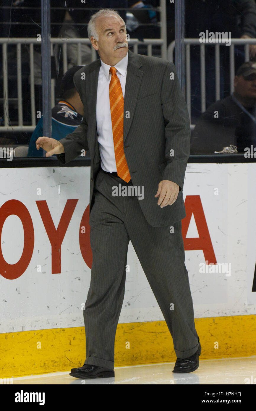 Feb 10, 2012; San Jose, CA, USA; Chicago Blackhawks head coach Joel Quenneville walks across the ice to the bench before the second period against the San Jose Sharks at HP Pavilion. Stock Photo