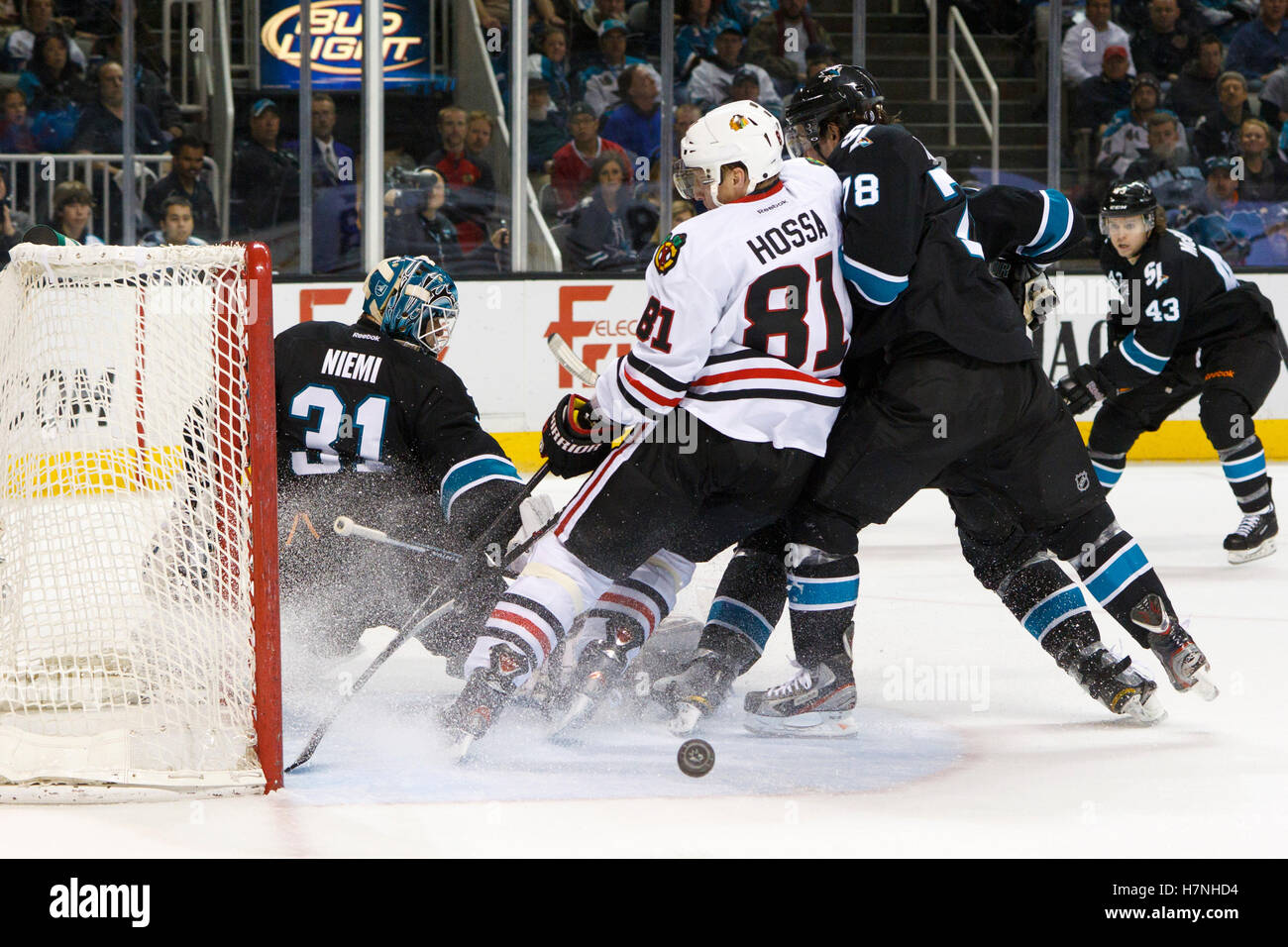 Feb 10, 2012; San Jose, CA, USA; San Jose Sharks goalie Antti Niemi (31) saves a shot in front of Chicago Blackhawks right wing Marian Hossa (81) during the second period at HP Pavilion. Stock Photo