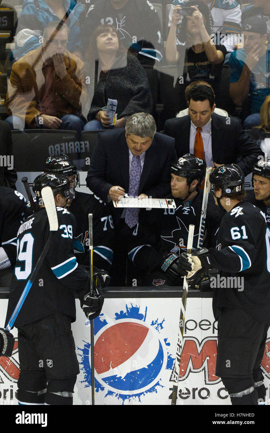 Feb 10, 2012; San Jose, CA, USA; San Jose Sharks head coach Todd McLellan draws up a play during a time out against the Chicago Blackhawks during the third period at HP Pavilion. San Jose defeated Chicago 5-3. Stock Photo