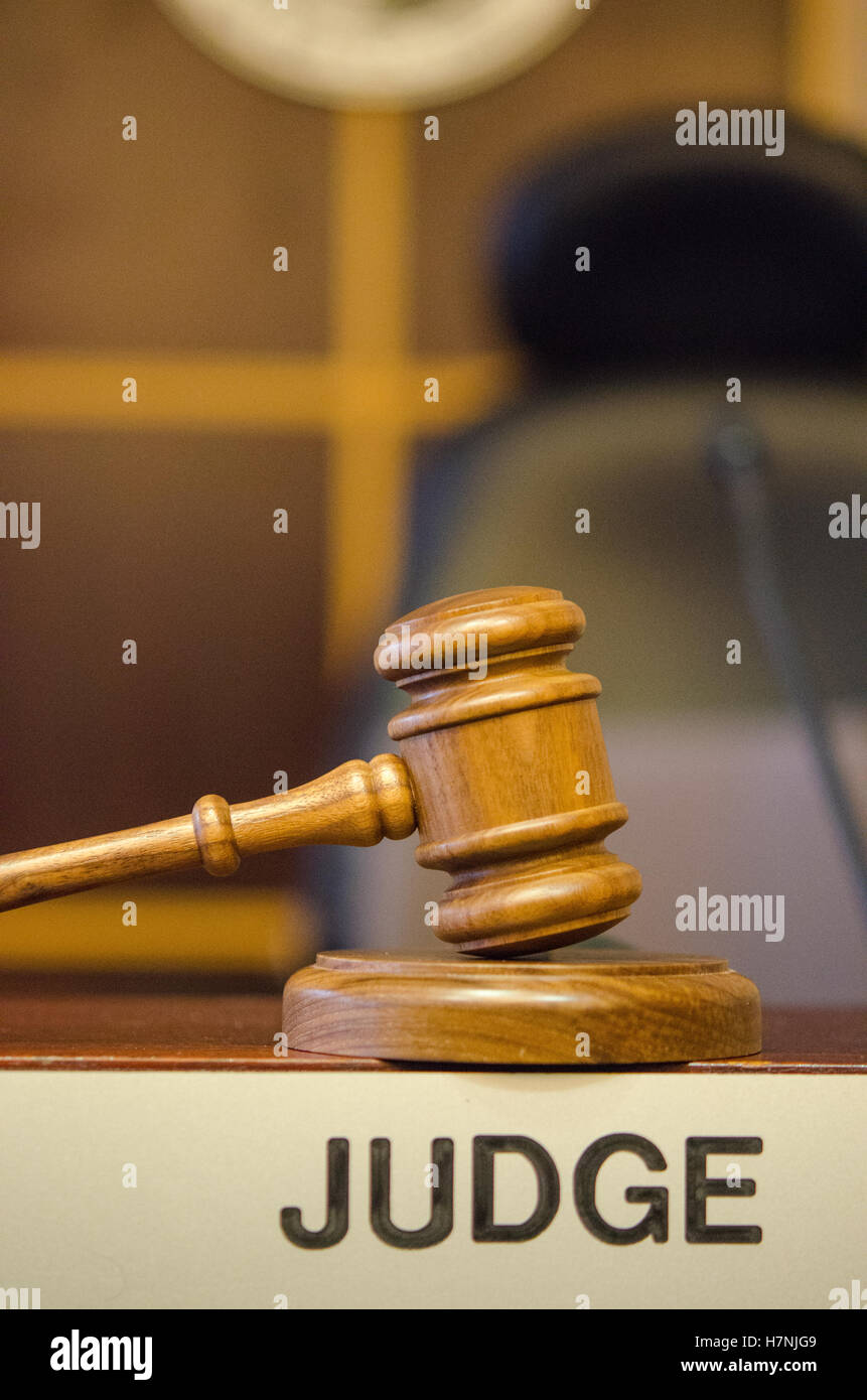 Gavel on judge's bench with word judge Stock Photo