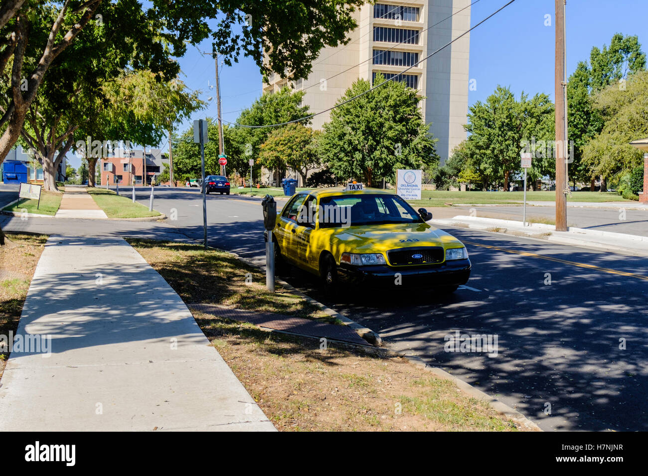 A taxi from Yellow Cab Co. waits for a fare in Oklahoma City, Oklahoma, USA. Stock Photo