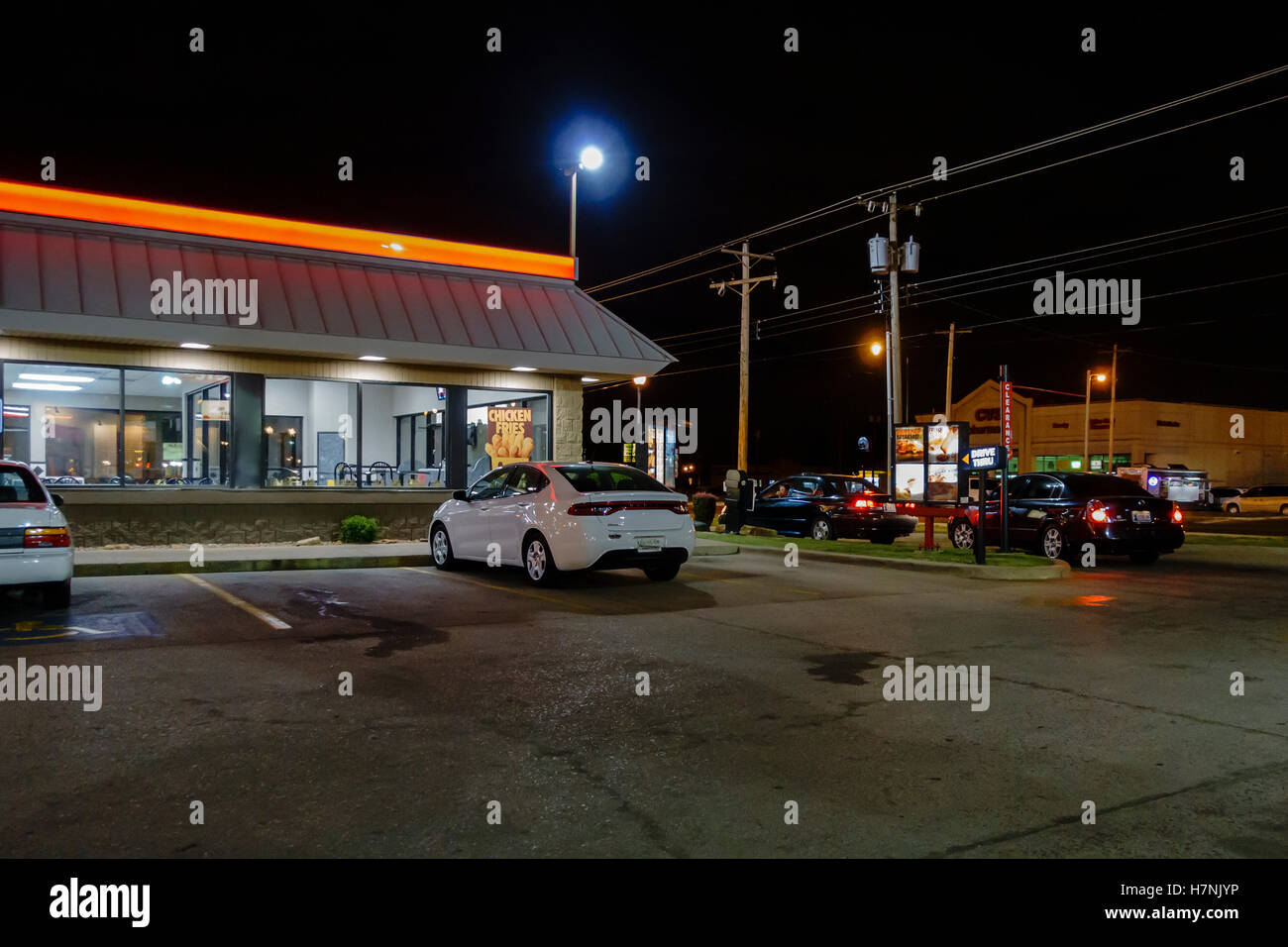 Burger King exterior and drive through window at night. Oklahoma City, Oklahoma, USA. 23rd St. and Meridian. Stock Photo