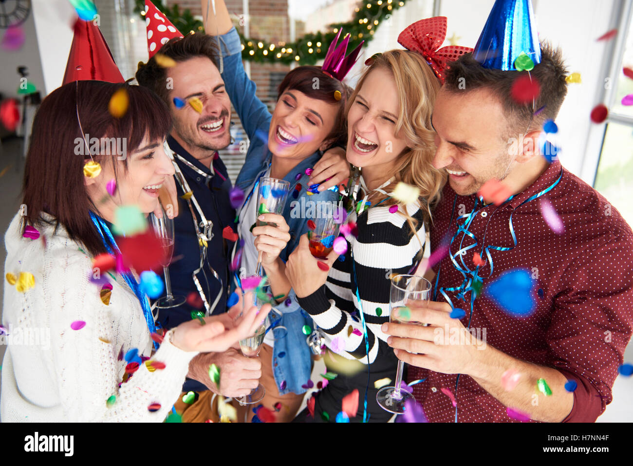 Laughing and celebrating the new years eve Stock Photo