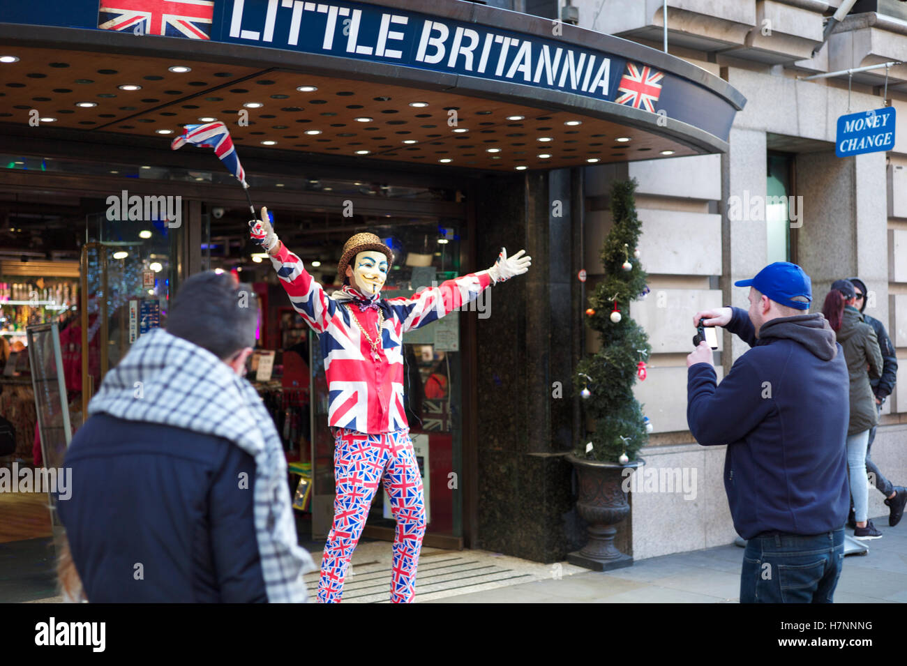 Little Britannia. Masked man wearing Union jack clothing Stock Photo