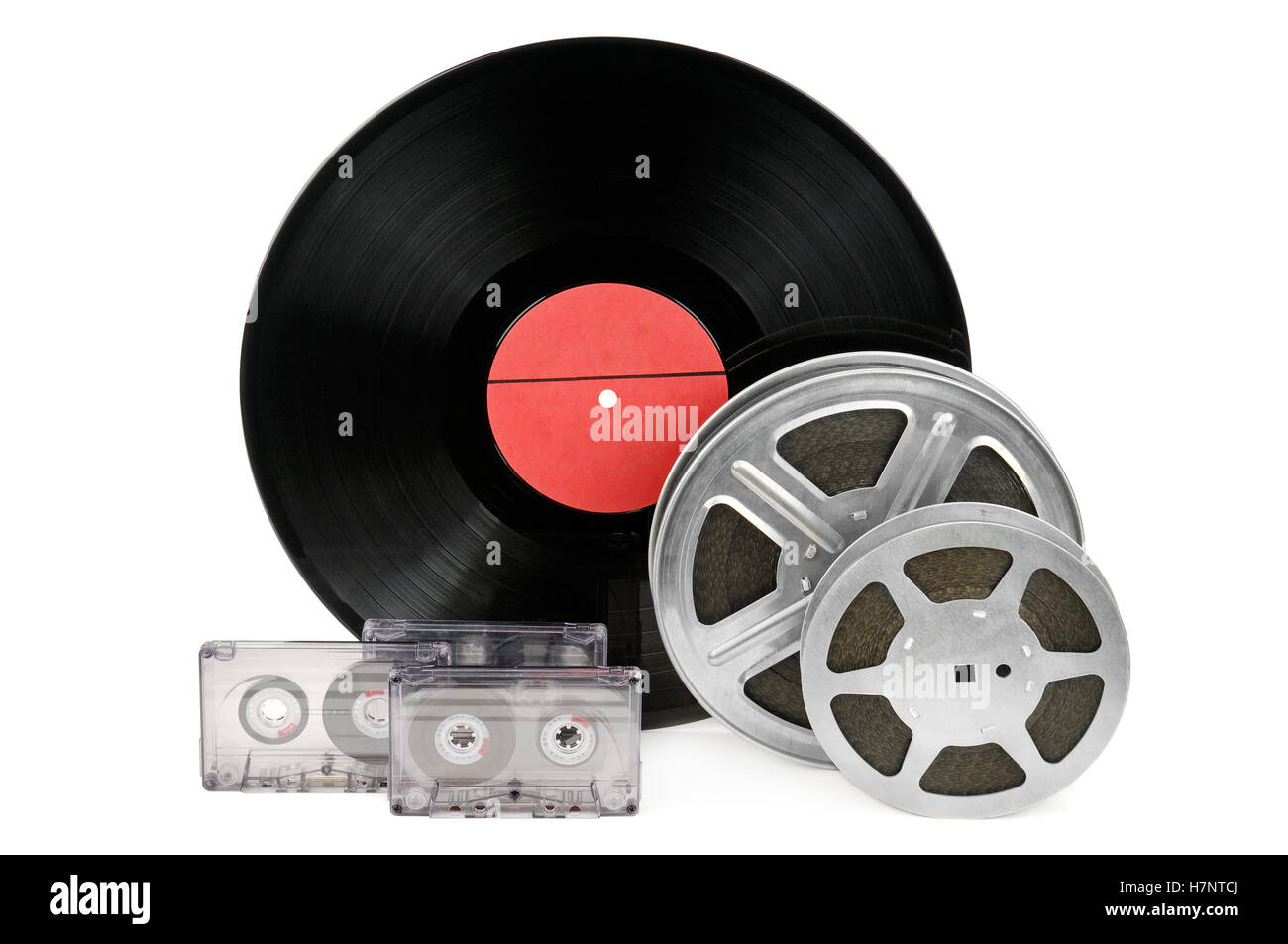 audio cassettes, records and film strip isolated on white background Stock Photo