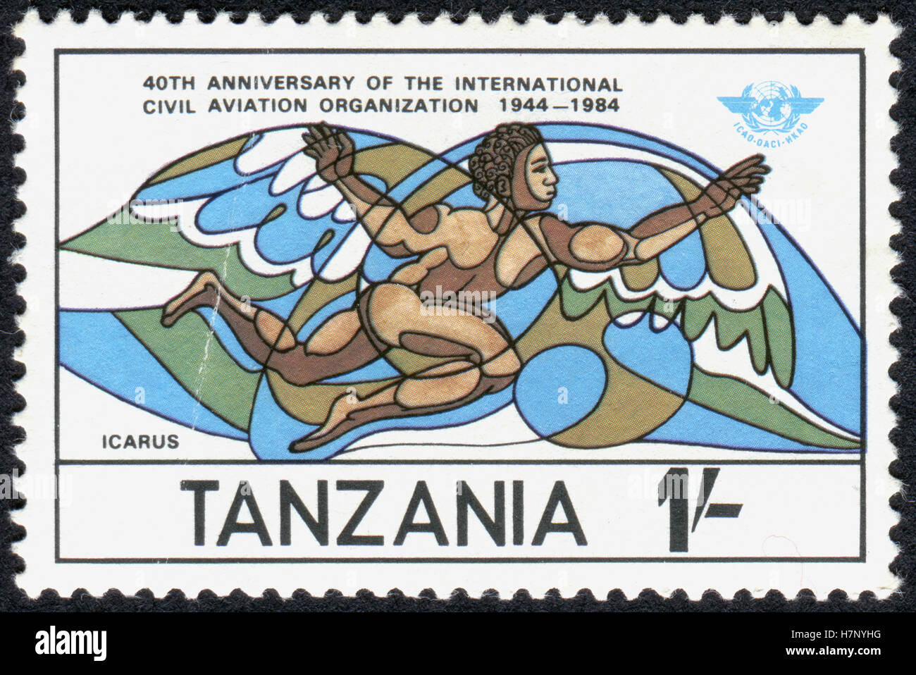 A stamp printed in Tanzania dedicated to 40 Years International Organization for Civil Aviation, shows Icarus. Stock Photo