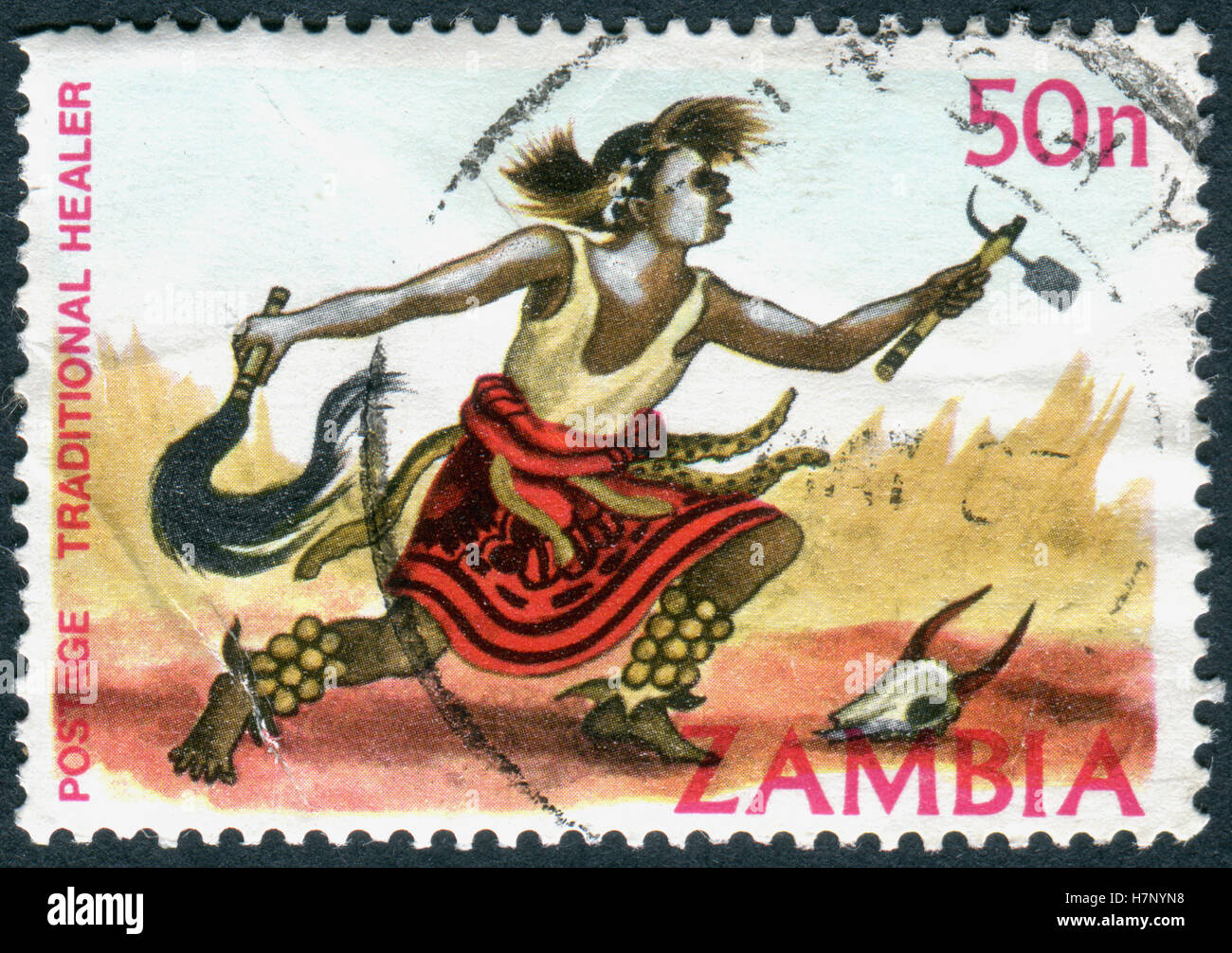 ZAMBIA - CIRCA 1981: A stamp printed in Zambia, is dedicated to Cultural Heritage, shows a Traditional healer, circa 1981 Stock Photo