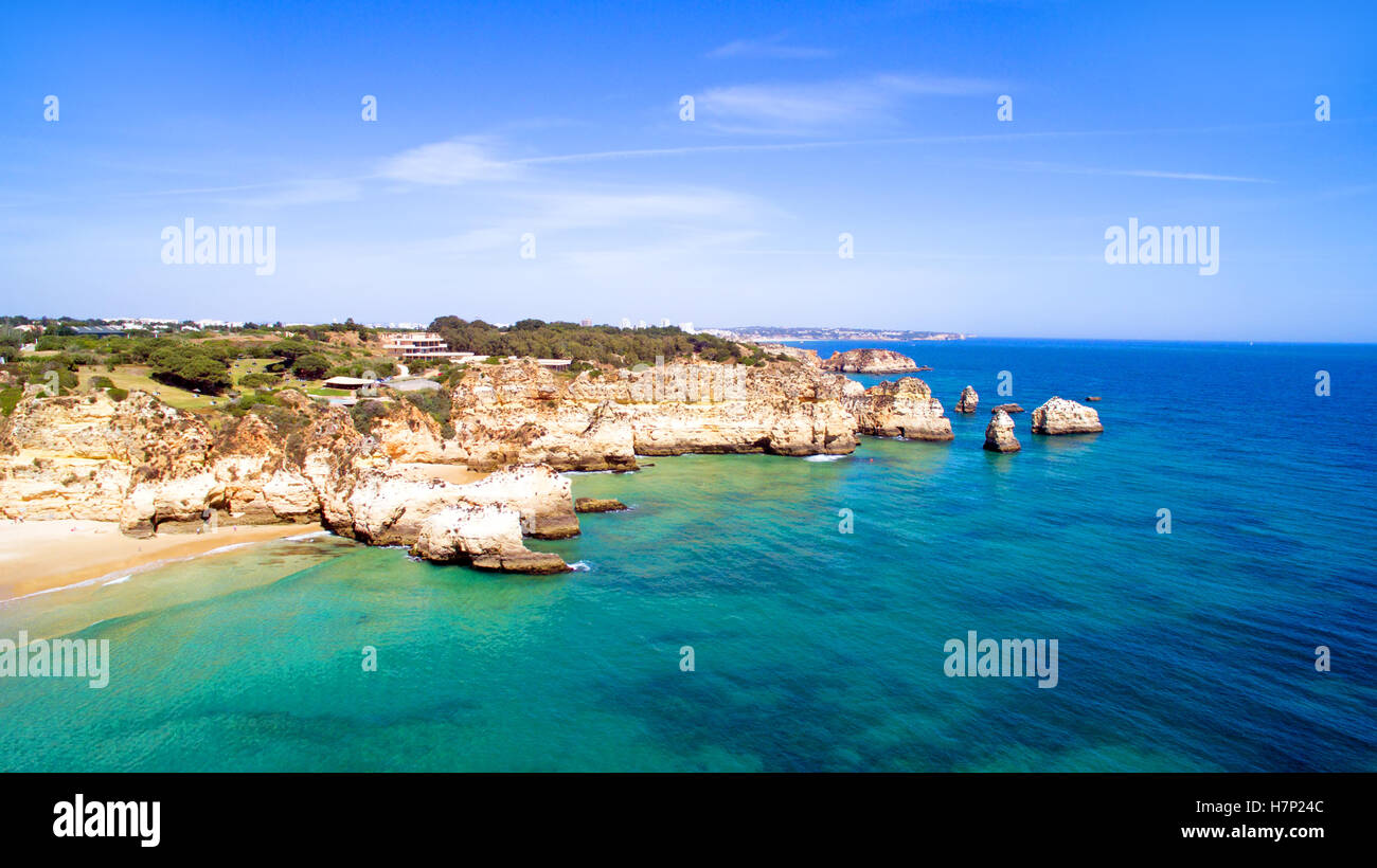 Aerial from natural rocks at Praia Tres Irmaos near Alvor in Portugal Stock Photo