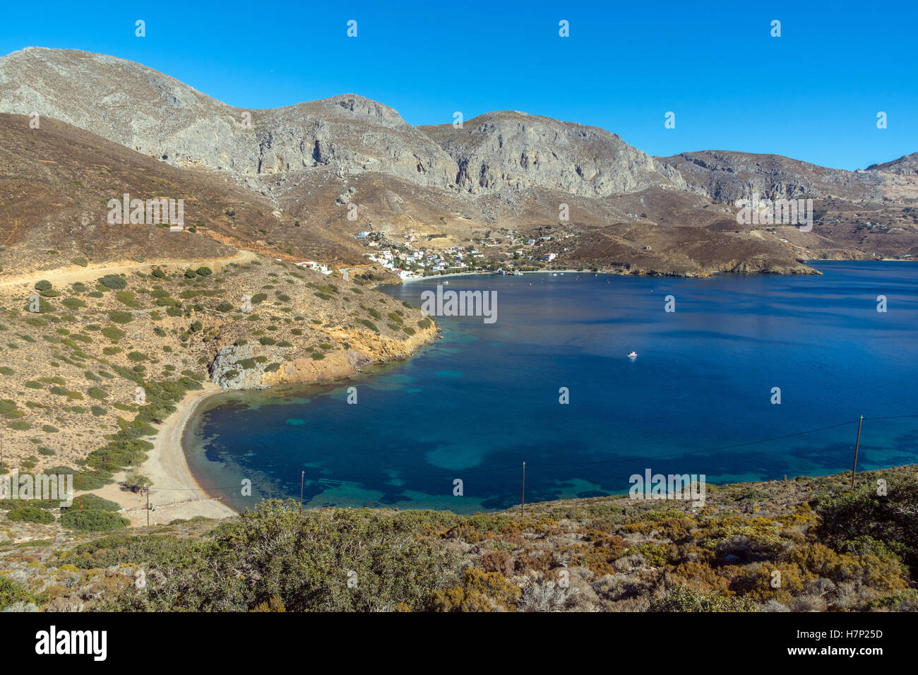 Beach blue sea and mountains, Emborios Bay, Kalymnos Stock Photo