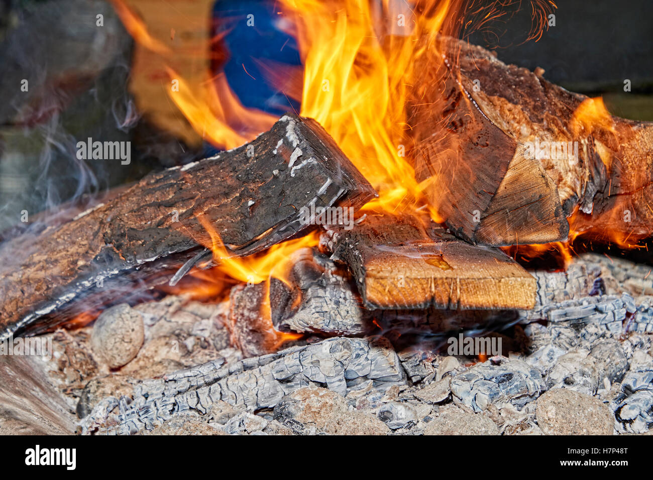 Wood burning in a fire pit in the UK Stock Photo Alamy