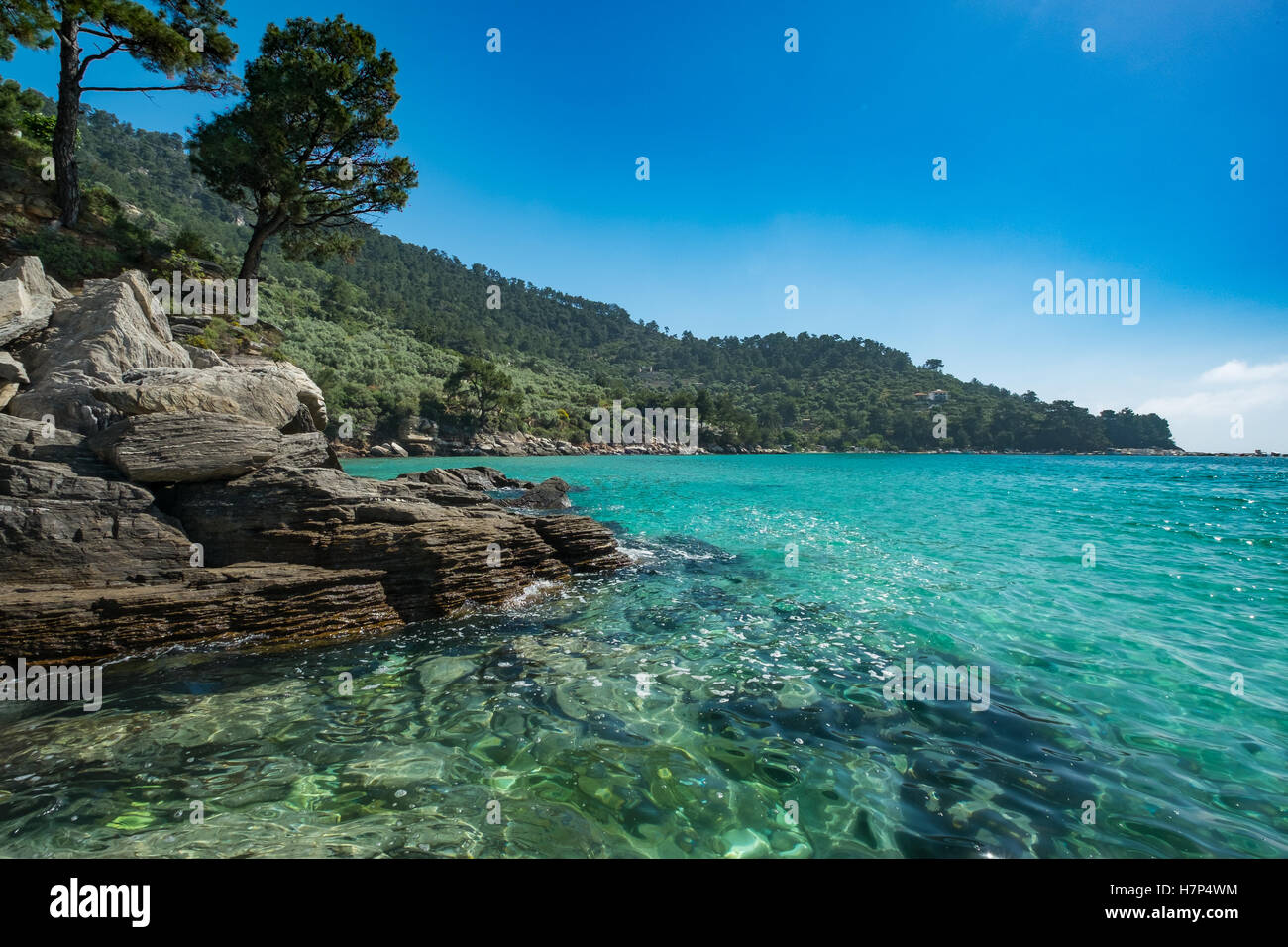 Beautiful rocky Greek coastline. Stock Photo