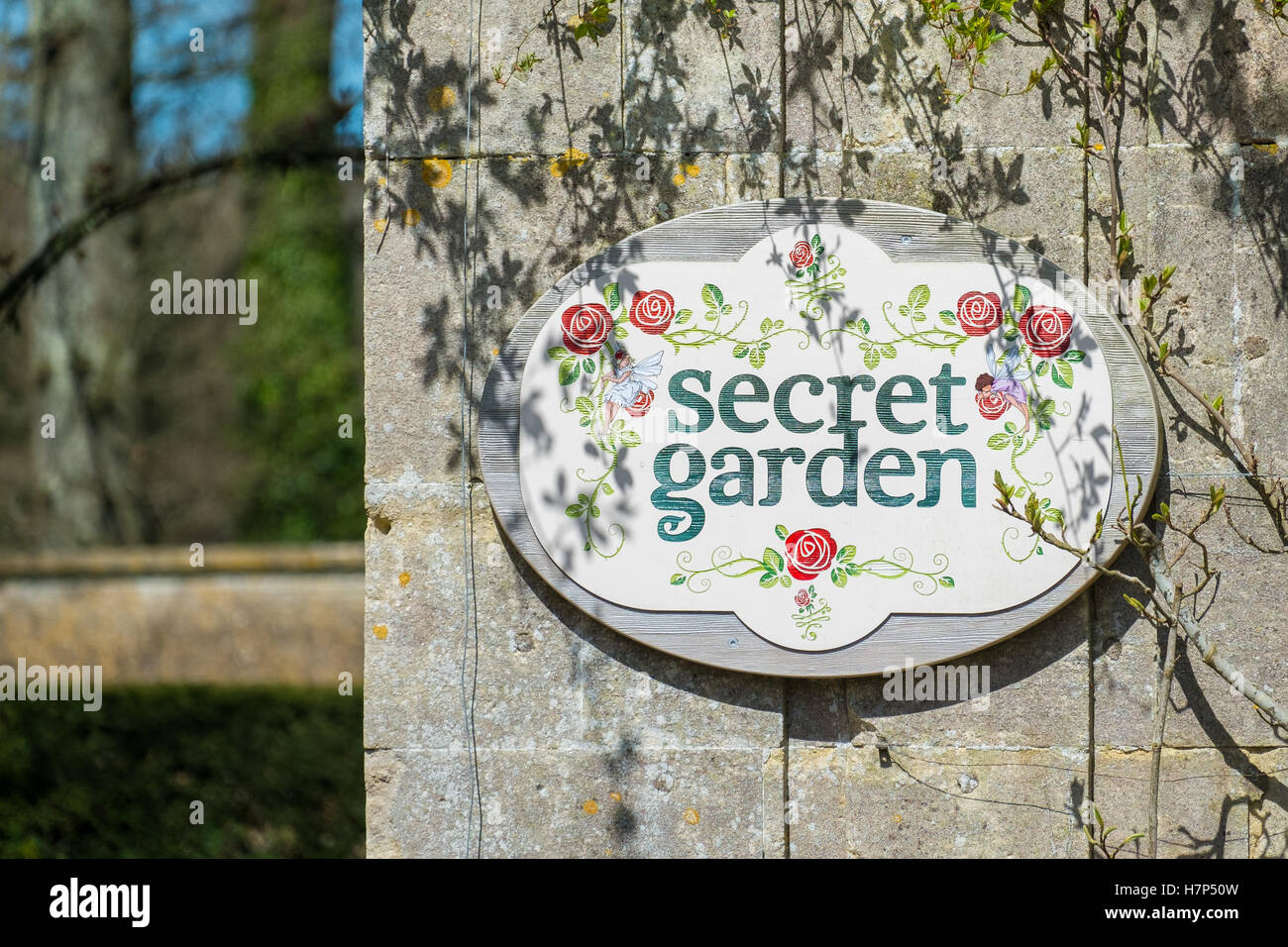 Secret garden sign on a wall. Stock Photo