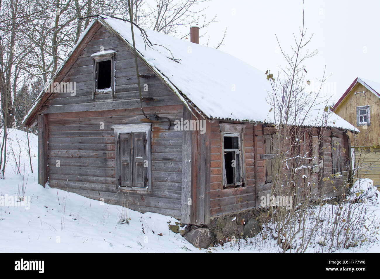 Old abandoned wooden house in a frosty winter Stock Photo - Alamy