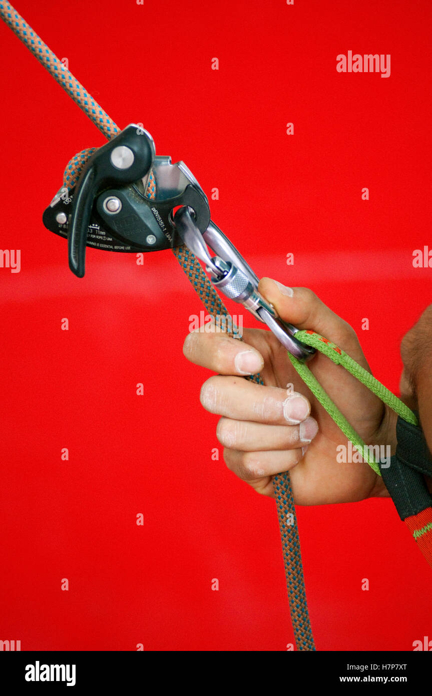 Man Adjusting Rock Climbing Gear Stock Photo Alamy