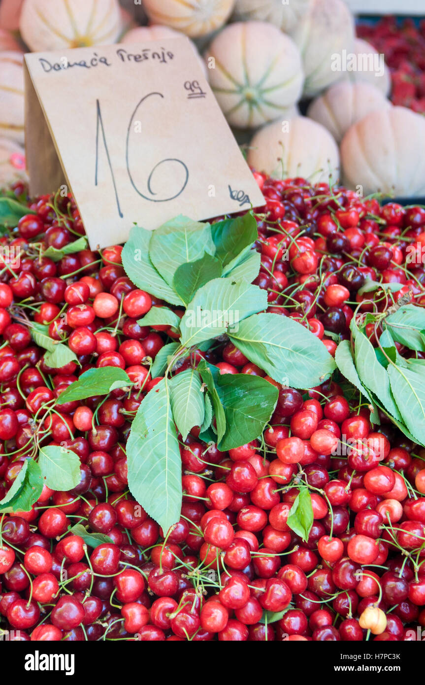 Fresh red cherries/trešnja on a market stall in Split, Croatia Stock Photo