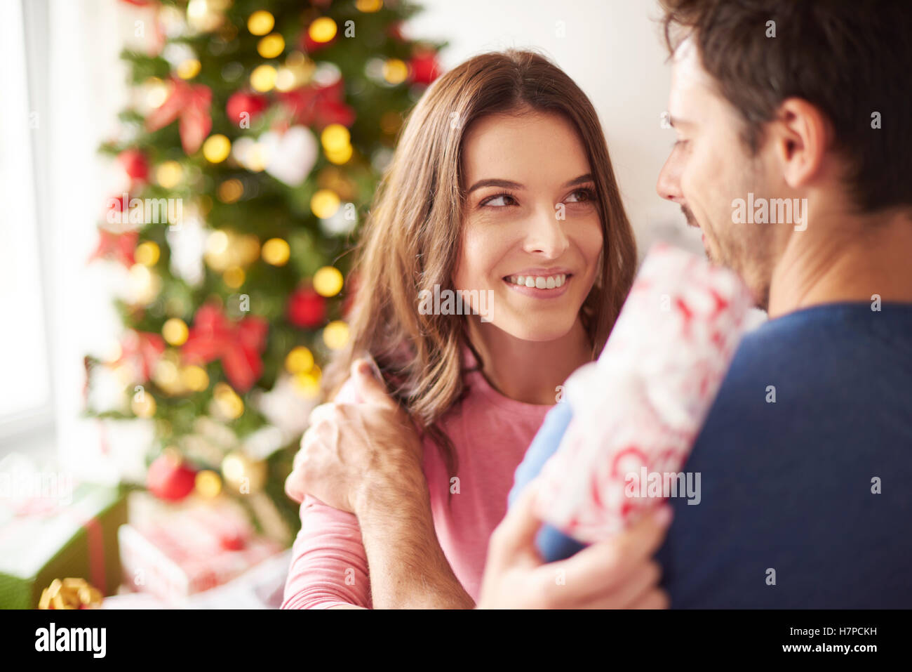 Couple spending Christmas together at home Stock Photo