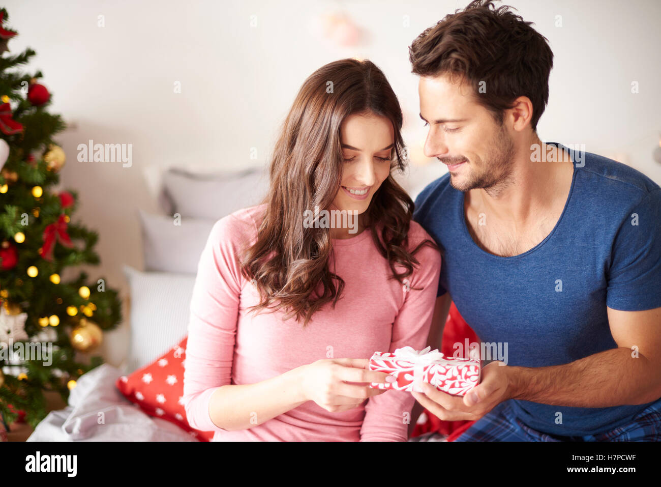 Giving the Christmas presents with love Stock Photo