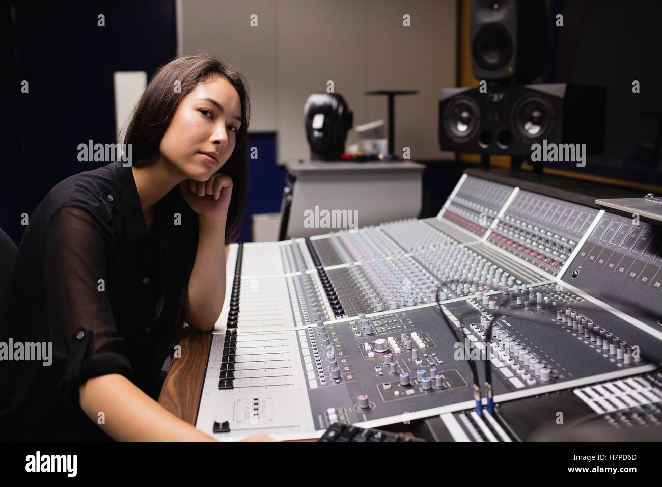 Female student using sound mixer Stock Photo - Alamy