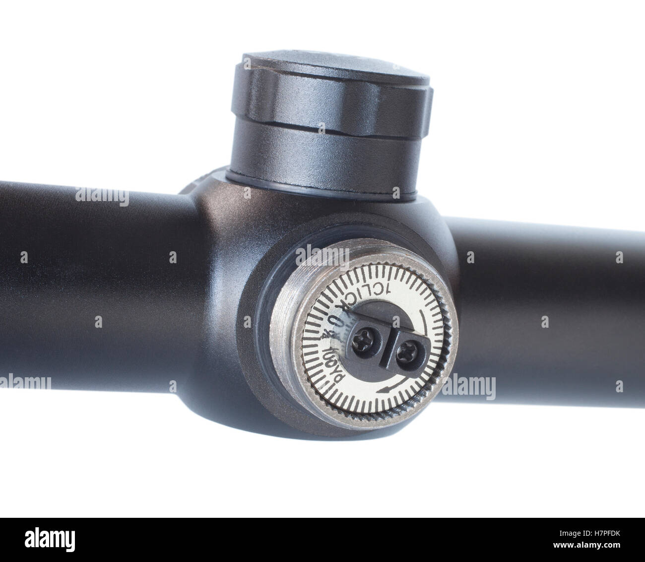 Knob on a rifle scope that is used to adjust elevation isolated on