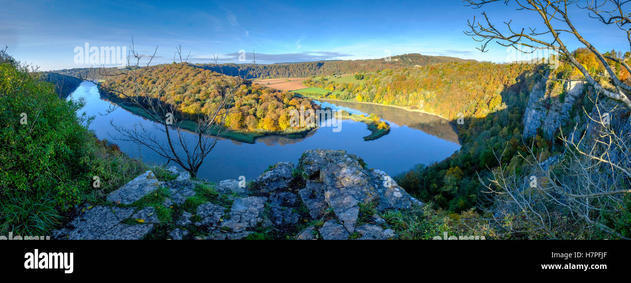 View of Wintour's Leap on River Wye in Woodcroft Gloucestershire England with trees in autumn colours and blue sky Stock Photo