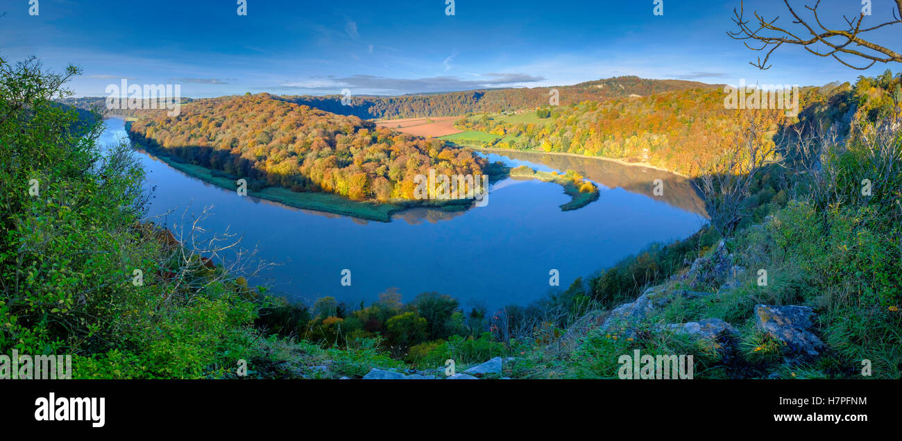 View of Wintour's Leap on River Wye in Woodcroft Gloucestershire England with trees in autumn colours and blue sky Stock Photo