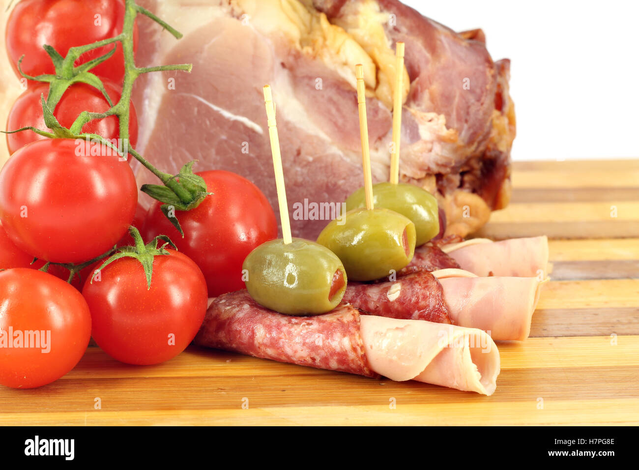 food ham salami olives and tomatoes Stock Photo